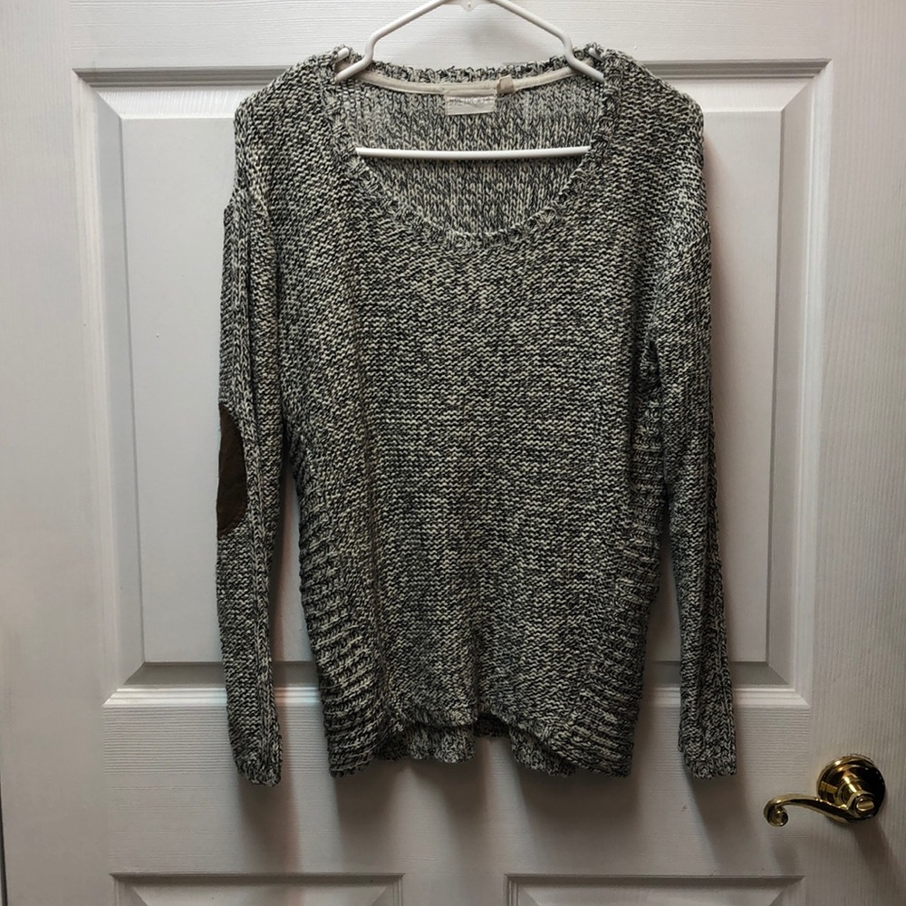 Black and white scoop neck sweater with brown elbow patches